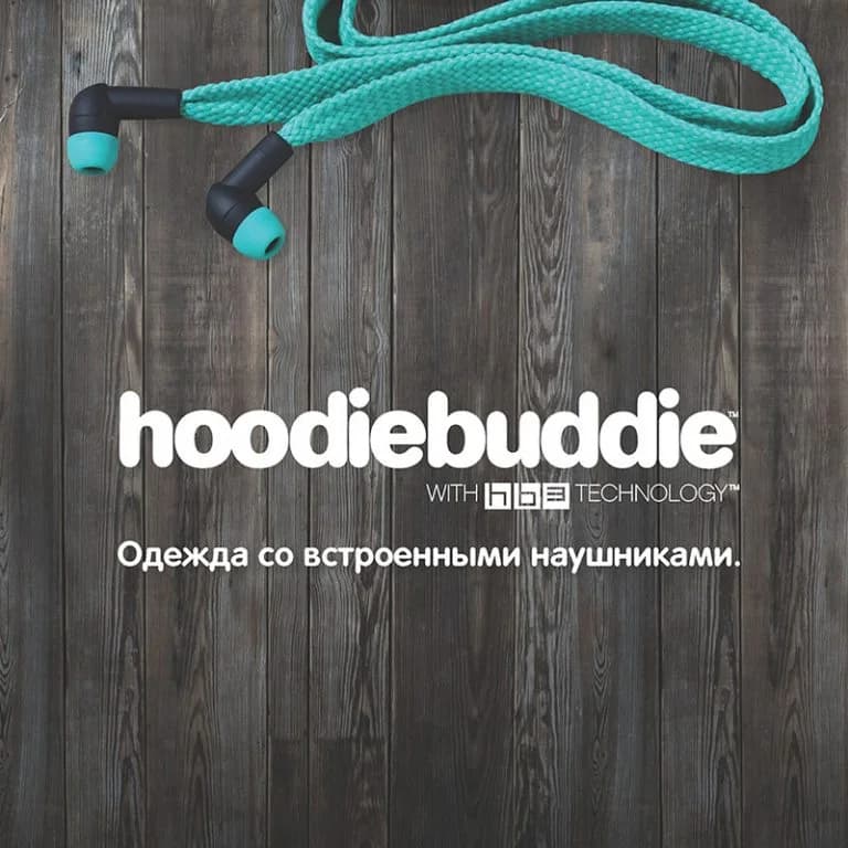 Hoodiebuddie clothing catalog cover with built-in earphones on a wood background