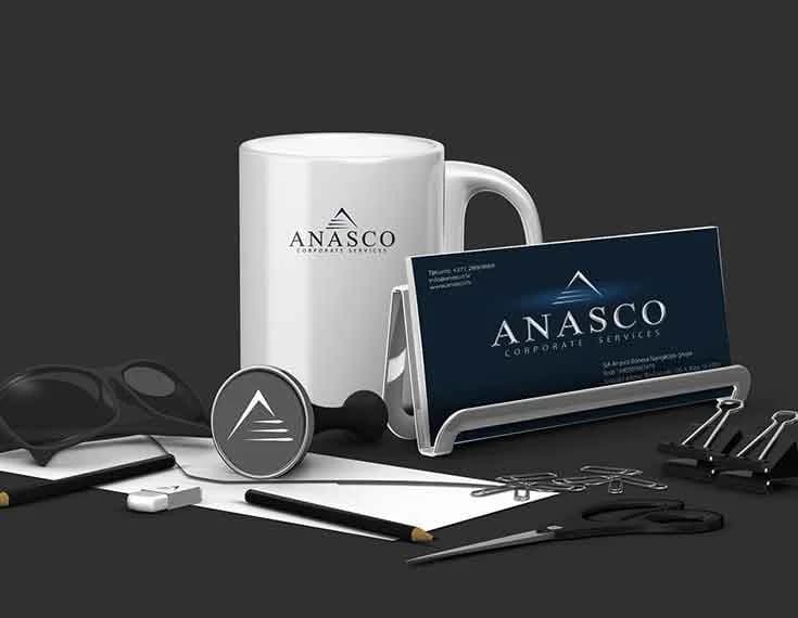 Anasco Corporate Services stationery mockup — mug, business card and badge