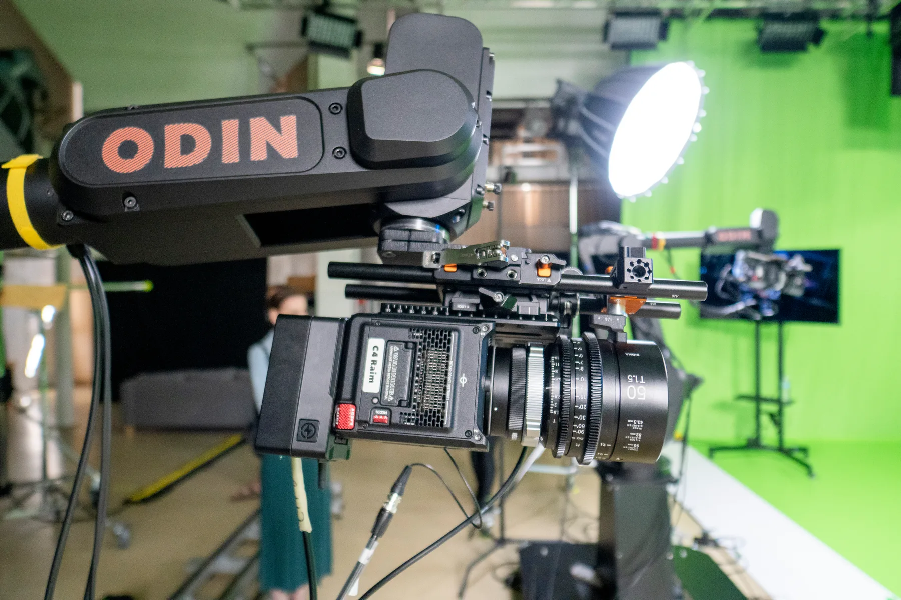 Close-up of a cinema camera mounted on a robotic motion-control arm